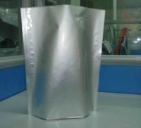 De prata lisos lustrosos levantam-se o Ziplock de empacotamento do malote da folha para o empacotamento de alimento